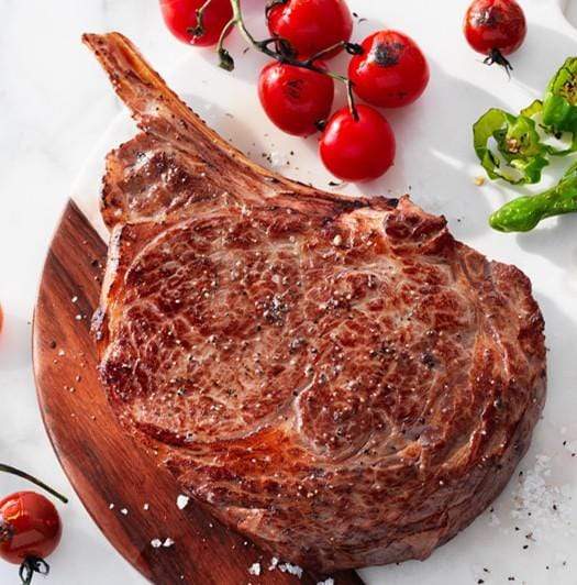 Cowboy Steak (BoneIn Ribeye) USDA Top Choice The Meat House Market